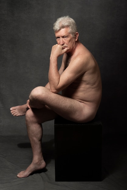 Photo sensitive old man portrait in studio