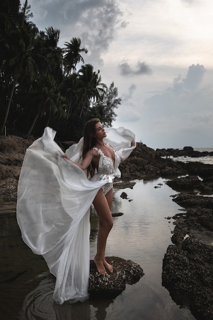 Sensual bride wearing beautiful wedding dress