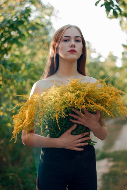 Sensual gentle woman floral bra Sensual spring girl Woman with flowers Perfect woman with flower