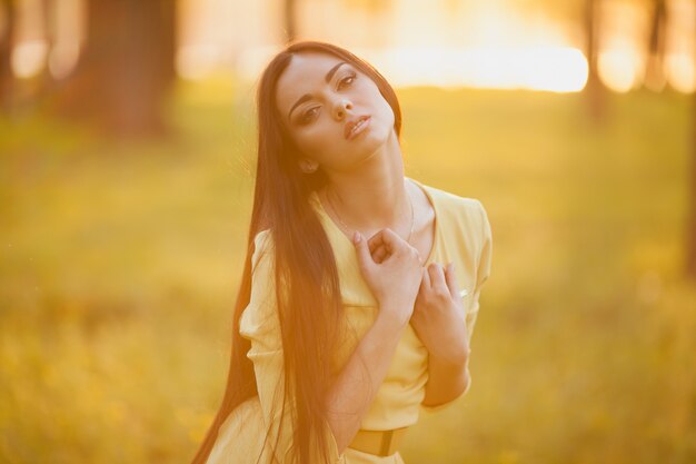 Sensual model in golden sunlight