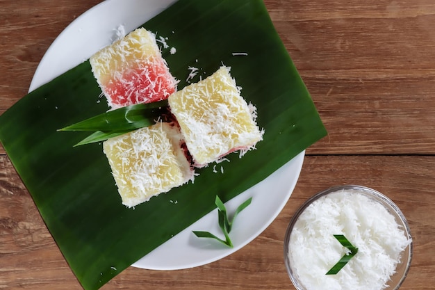 Sentiling is Indonesian traditional snack made from steamed grated cassava and grated coconut