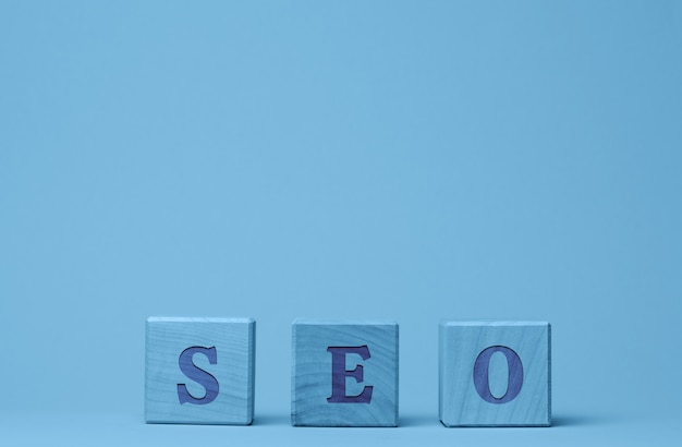 SEO inscription search engine optimization on wooden cubes concept of a set of measures for internal and external optimization to improve the position of the site in the results of search engines