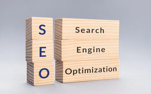 SEO Search Engine Optimization text on wooden blocks on gray background