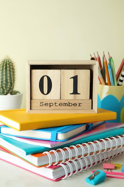 september 1 concept on white textured table