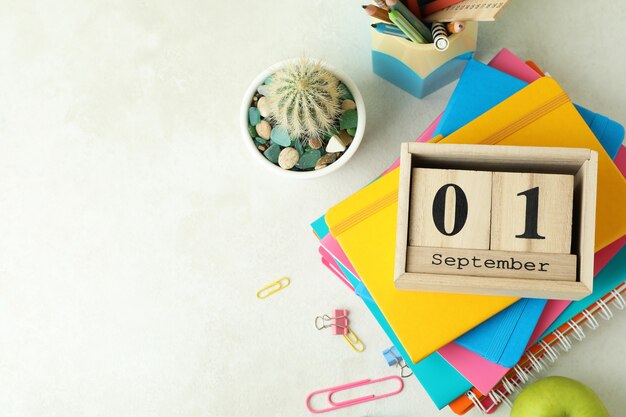 september 1 concept on white textured table
