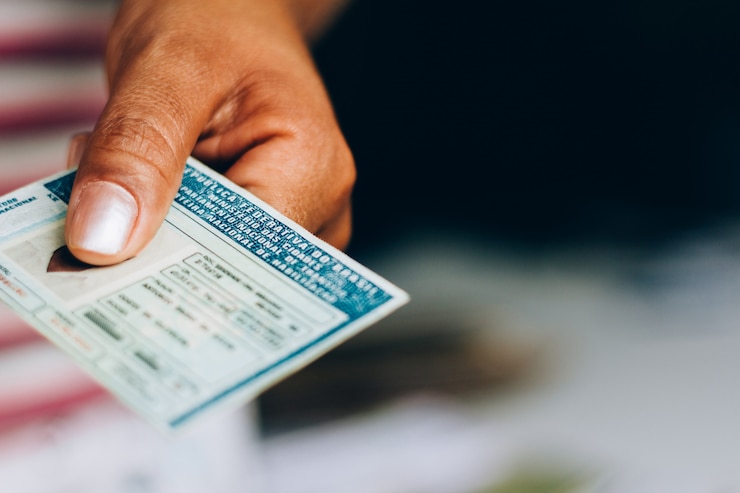 September 10, 2019, Brazil. Man holds National Driver's License (CNH). Official document of Brazil, which attests the ability of a citizen to drive land vehicles.