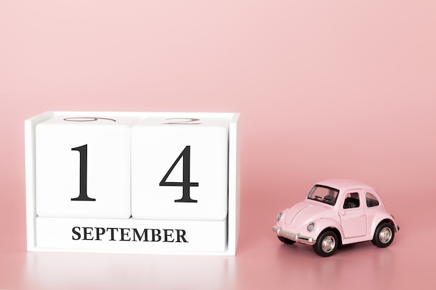 September 14th. Day 14 of month. Calendar cube with car