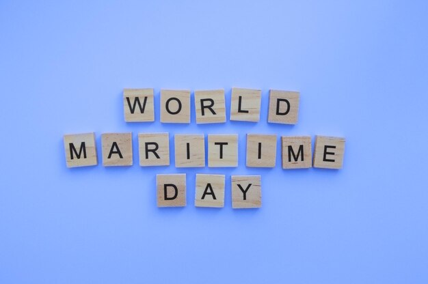 September 28 World Maritime Day minimalistic banner with the inscription in wooden letters