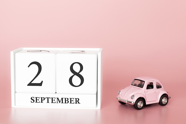 September 28th. Day 28 of month. Calendar cube with car