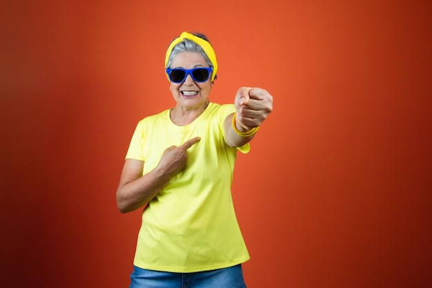 September 7th Brazil Independence Day Mature Woman with Gray Hair yellow shirt isolated