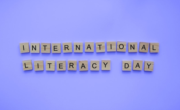 September 8 International Literature Day minimalistic banner with the inscription in wooden letters