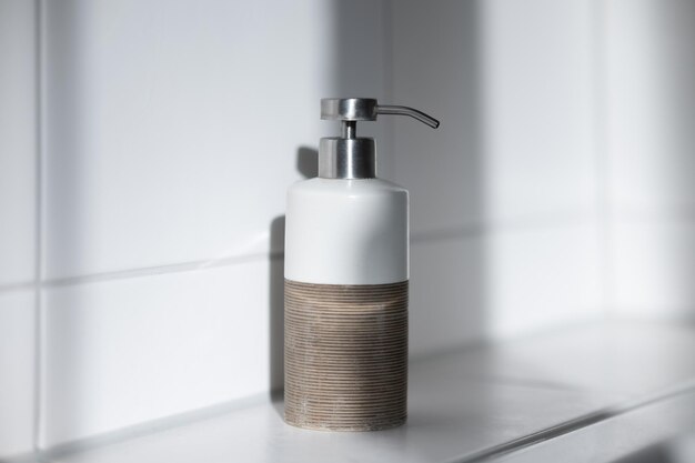 Seramic container for liquid soap dispenser in the bathroom