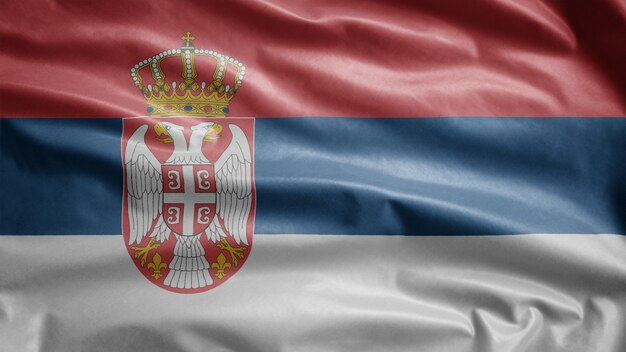 Serbian flag waving in the wind. serbia blowing soft silk.