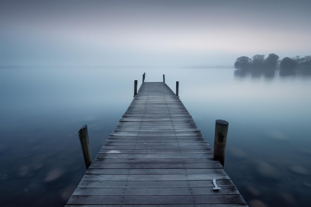 Serene Jetty on a Quiet Body of Water