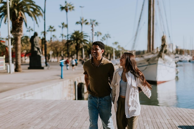 serene stroll along barcelona marina at with vintage sailing vessel