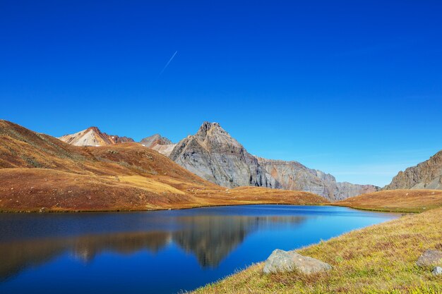 Serenity lake in the mountains in summer season. Beautiful natural landscapes.