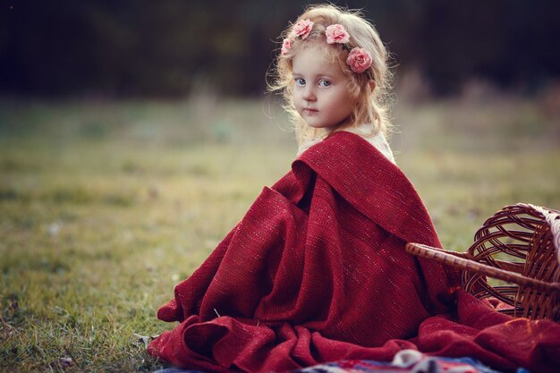 A series of photos of red-haired children. Girl and boy in nature, sunset, autumn. Happy time