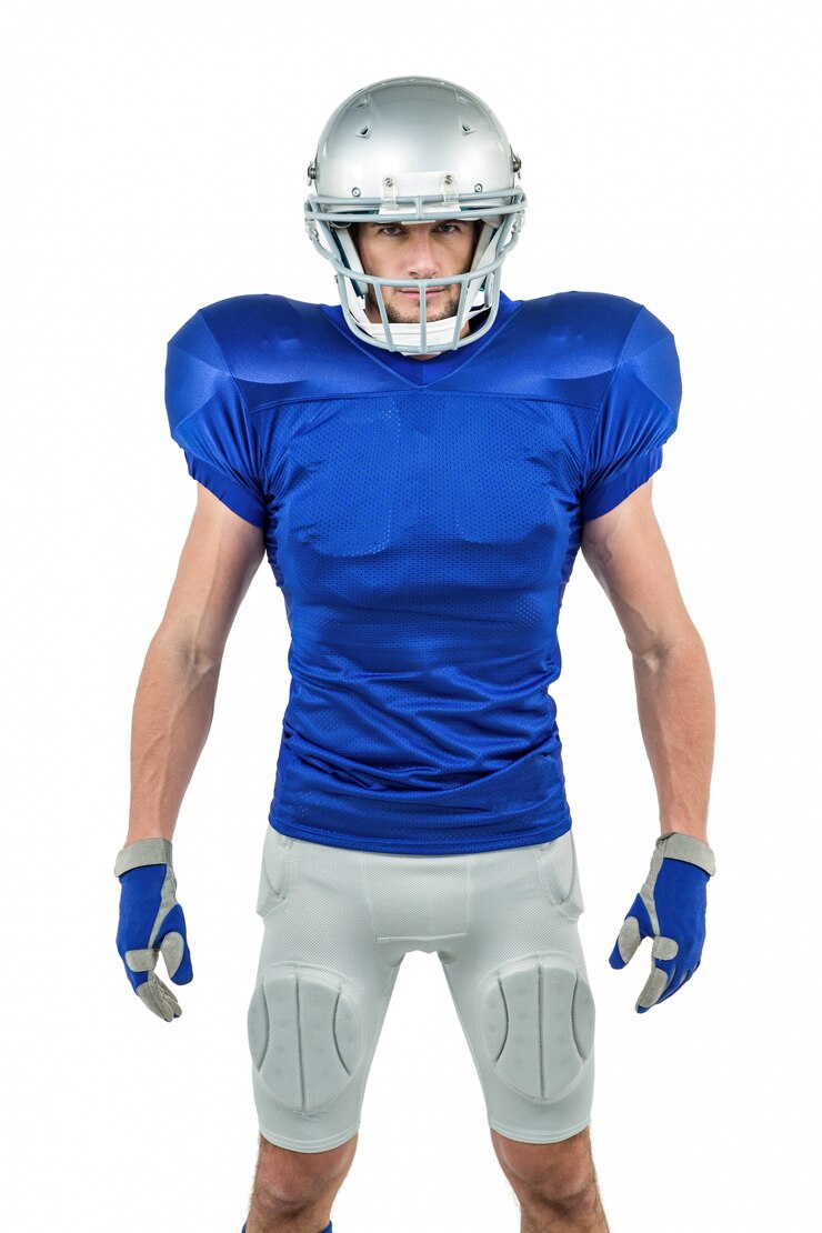 Photo serious american football player standing