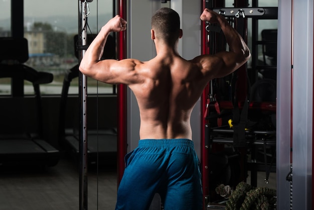 Serious Bodybuilder Standing In The Gym