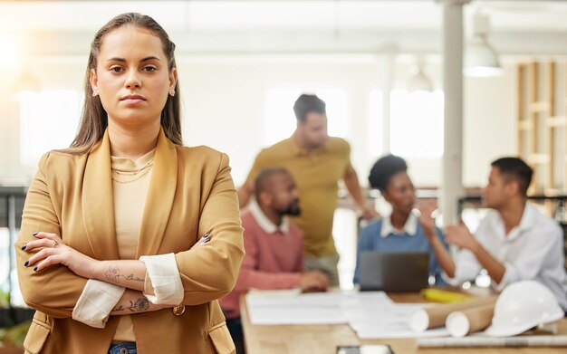 serious business and arms crossed with portrait of woman in meeting for planning leadership and project management creative training and face of employee in office for teamwork and workshop