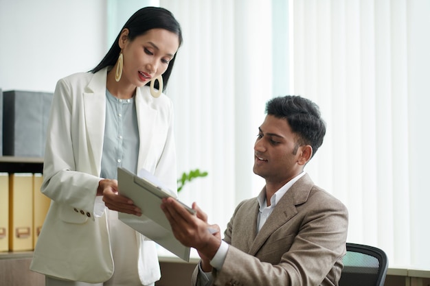 serious business couple working at desk