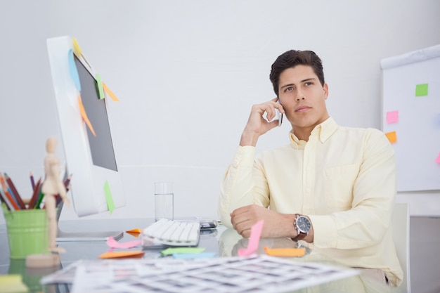 Serious businessman on the phone