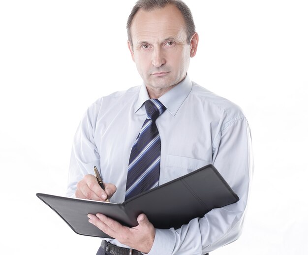 Serious businessman with a clipboard.isolated on white background