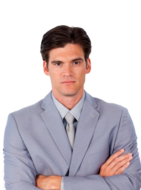 Serious businessman with folded arms 