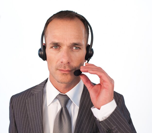 Serious businessman with a headset on 