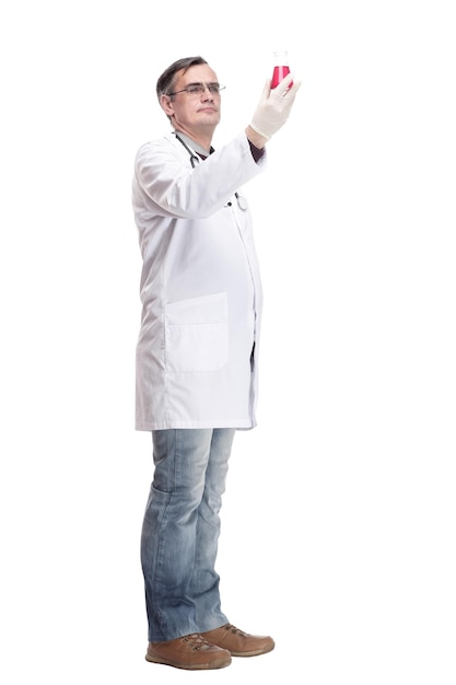 Serious doctor with a laboratory flask in his hands