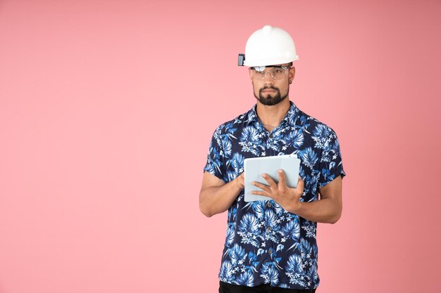 Serious engineer thinking about his next work