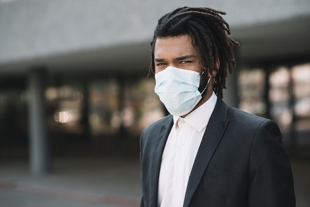 Serious man wearing medical mask