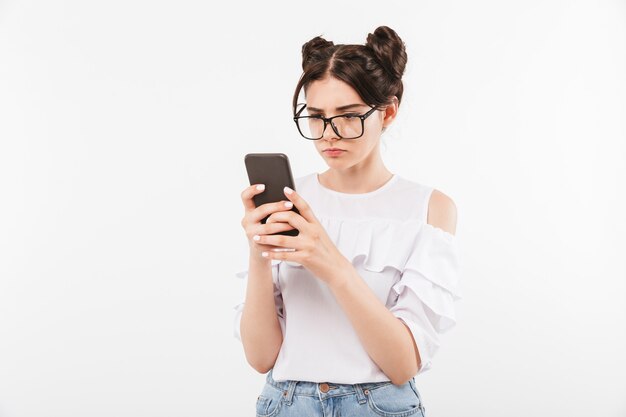 a serious young girl in sunglasses