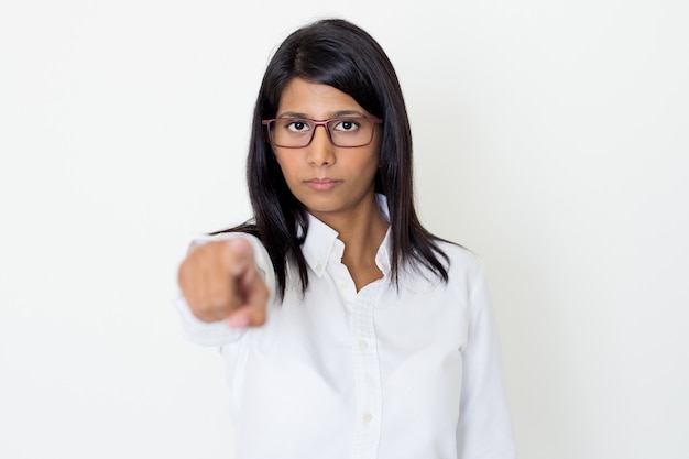 Serious Young Indian Woman Pointing at You