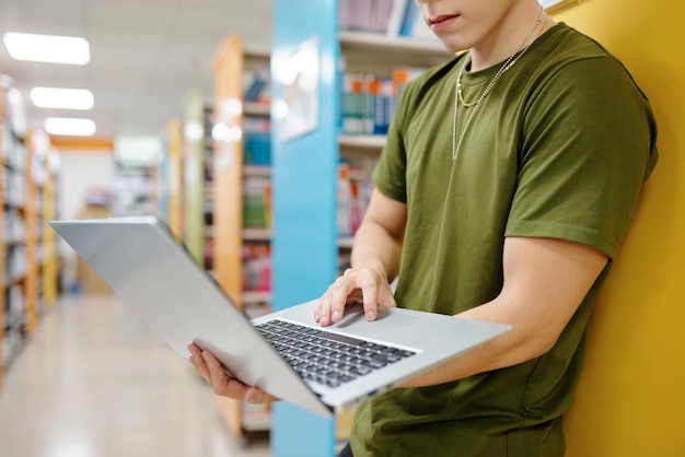 Serious Young Man Working on laptop