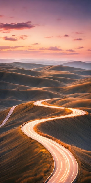 Photo a serpentine road endless and undulating through the heart of a vibrant countryside captured in an everlasting journey