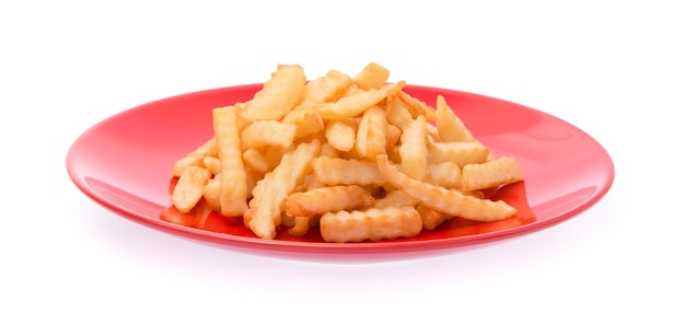 serrated french fries on a dish isolated on white background