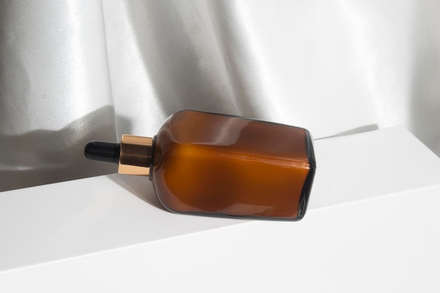 serum dropper cosmetic glass bottle, product packaging mockup container, branding luxury beauty fashion