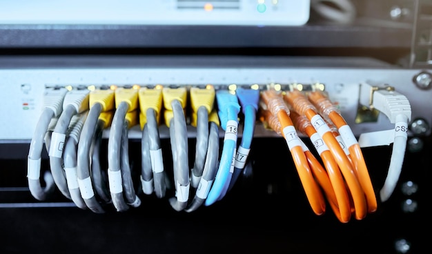 Server room computer and cable for internet connection cloud computing and cyber security Hardware wire and cord on equipment in a data center for IT and cyber data wiring for internet