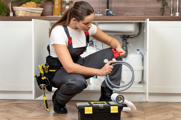 Service maintenance worker repairing