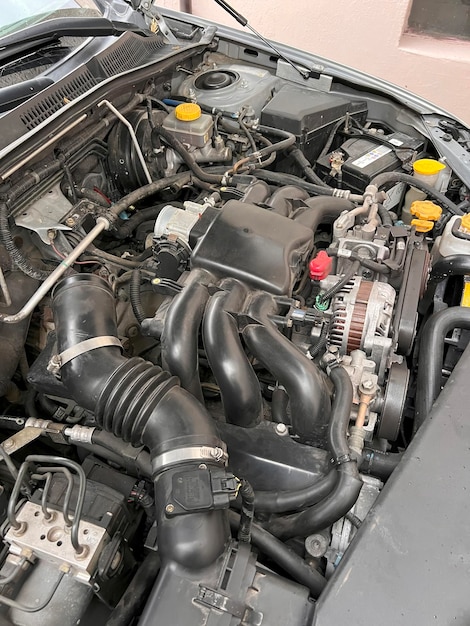 Service and repair of a 6cylinder boxer engine in a car