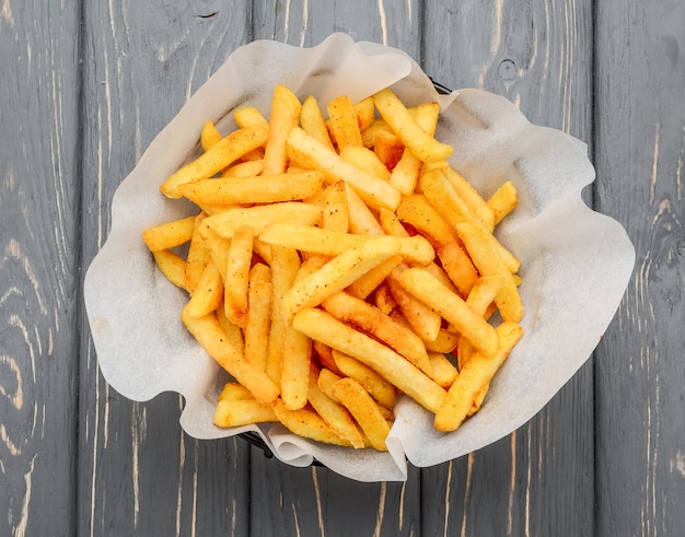 Photo a serving of fries, fried potatoes