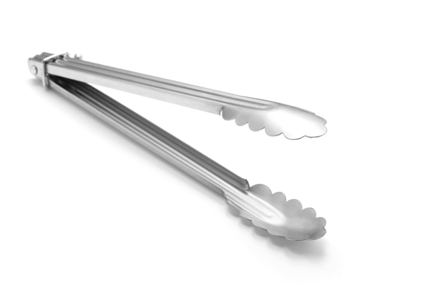 Serving kitchen tongs on white