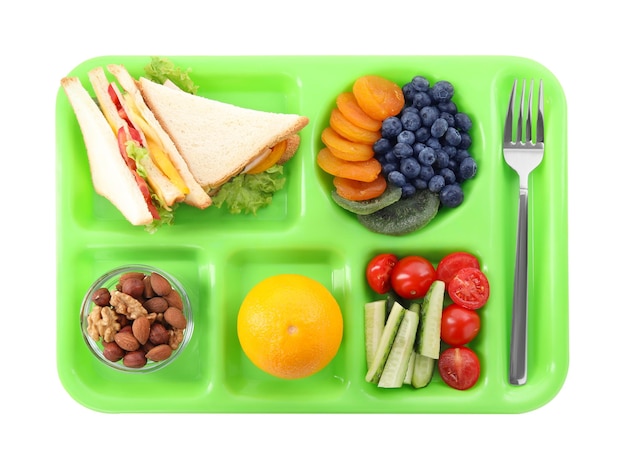 Photo serving tray with tasty healthy food isolated on white top view school dinner