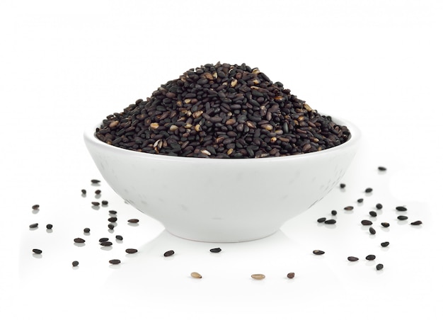 Sesame in a bowl on white wall