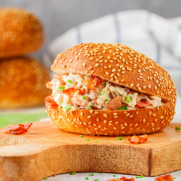 sesame bun sandwich with chicken salad