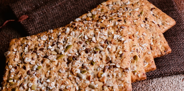 Sesame cracker on wooden board