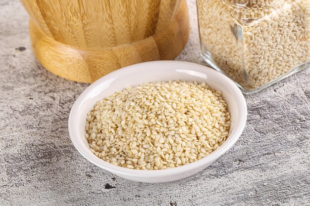 Sesame seeds heap in the bowl for cooking