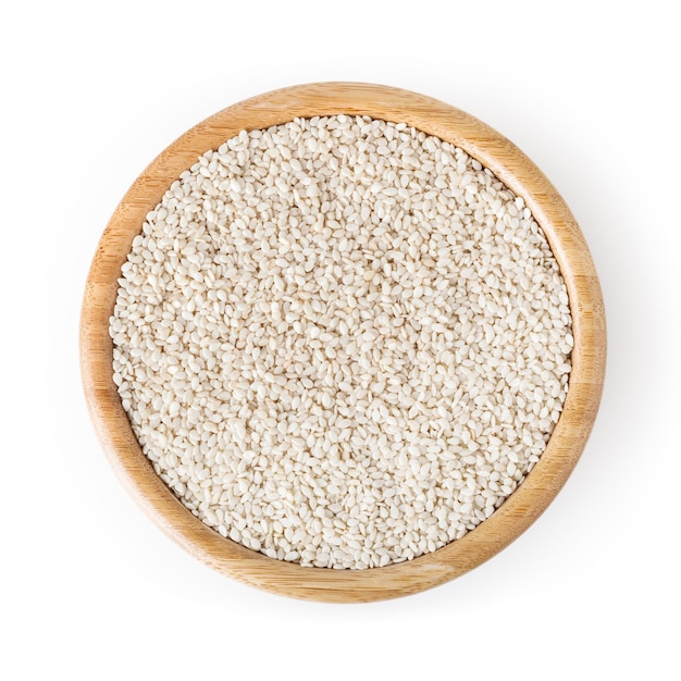 Sesame seeds isolated in wooden bowl on white background with clipping path