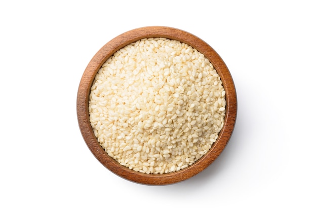 Sesame seeds on a wooden bowl